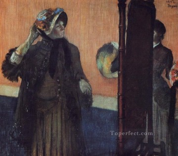 En las sombrereras Edgar Degas Pinturas al óleo